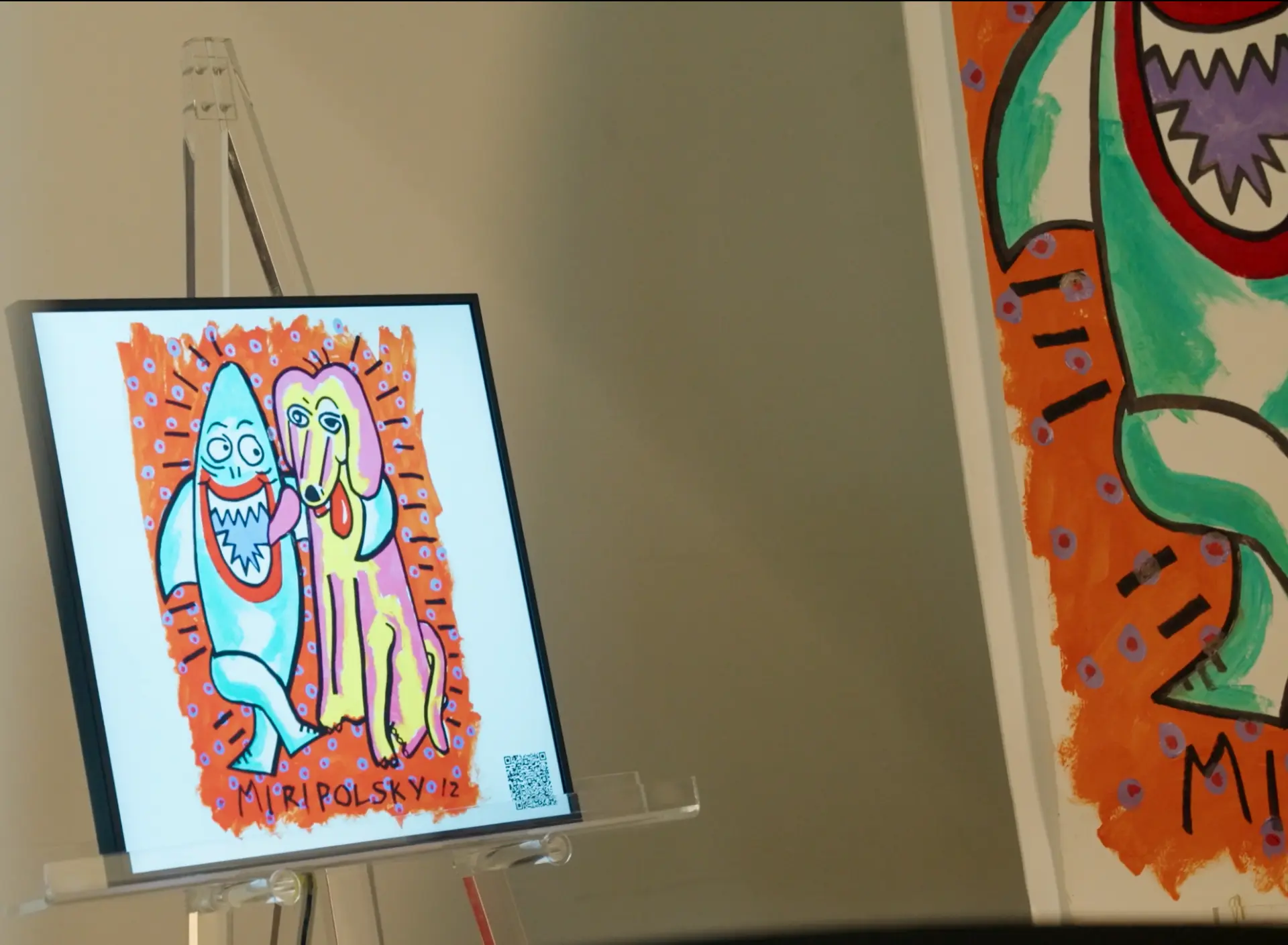 Marker-drawn Miripolsky dog painting displayed on a clear easel beside a larger canvas