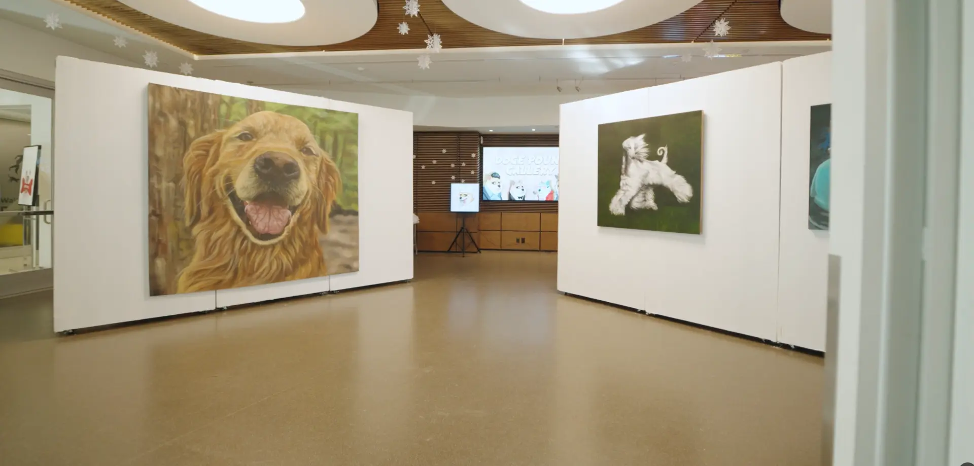 Gallery walls hung with large-scale painted dog portraits